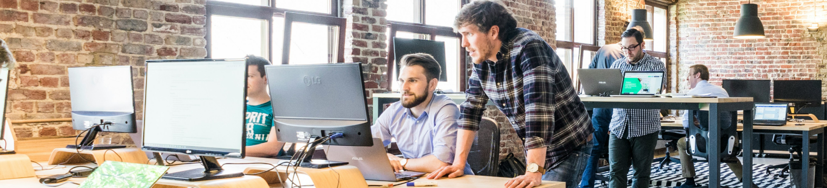 Woongjin HRM team members working together in an office