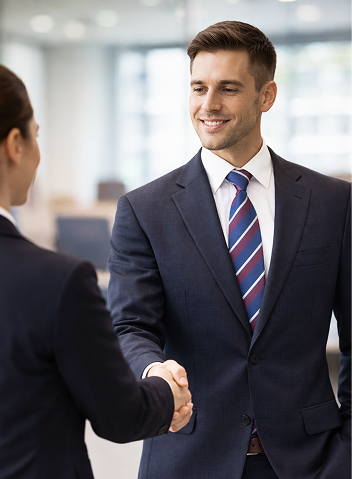 Business professional greeting a client